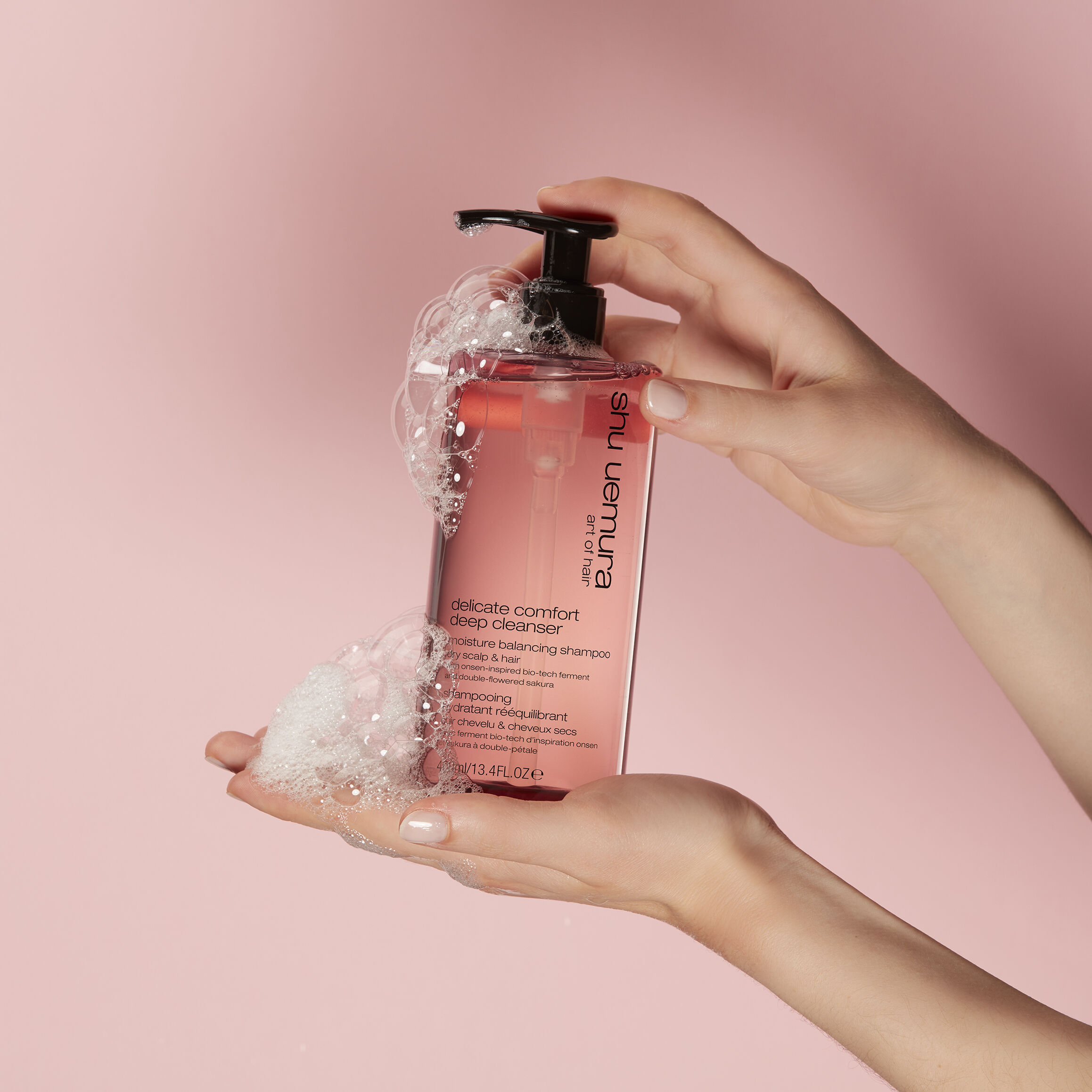 shu uemura art of hair delicate comfort deep cleanser product in hand