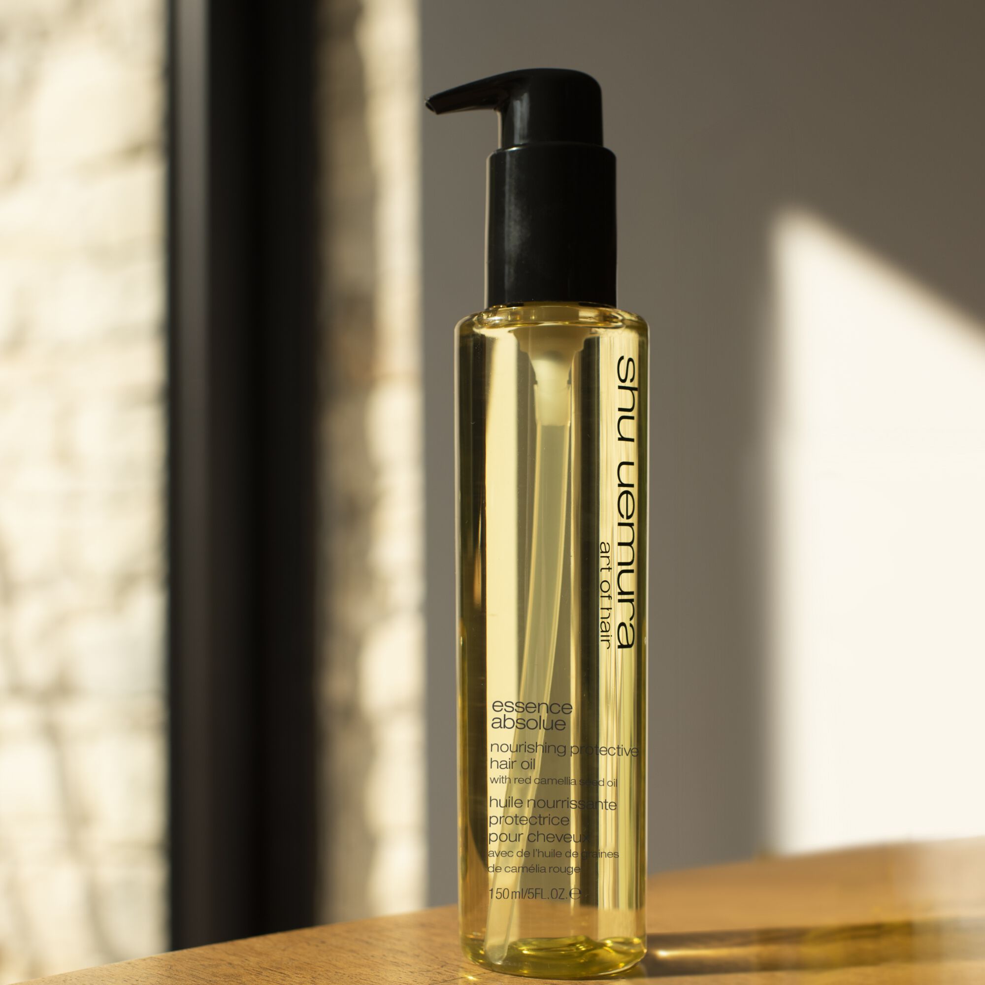 shu uemura art of hair essence absolue nourishing protective hair oiln lifestyle