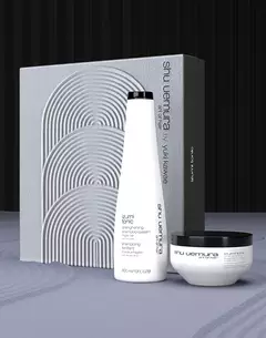 Shu Uemura Izumi Tonic hair care set, including a shampoo and treatment mask, displayed with a textured blue box labeled 'Shu Uemura by BUAISOU.'